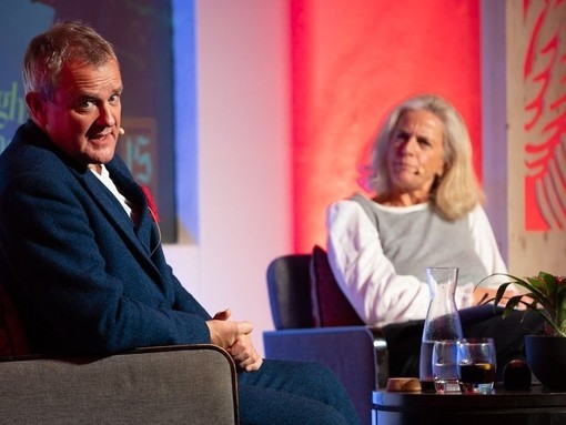Hugh Bonneville on stage at Stratford Literary Festival in 2022