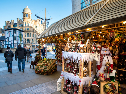 Christmas market stalls lining Cathedral Street in Manchester