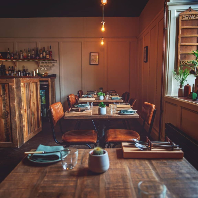 A row of tables at Chapters, a restaurant in Hay-on-Wye